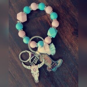 Charming Pink and Blue Beaded Bracelet with Charms